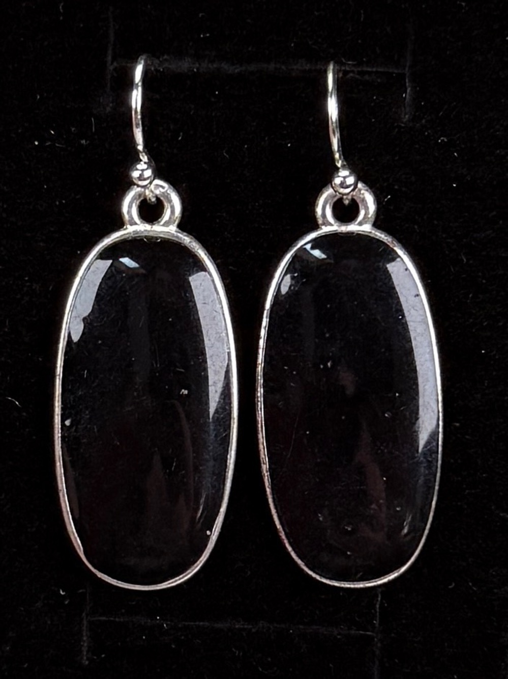 Vintage weighted black and silvertone pierced earrings